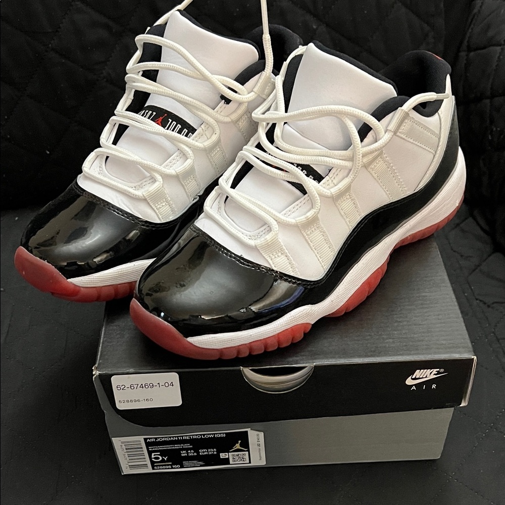 Nike Air Jordan 11 Low in Black, White, and Red